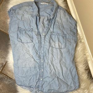 A short sleeved light denim shirt